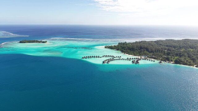 Bora Bora, French Polynesia. Aerial View of Turquoise Lagoon and Luxury Overwater Villas