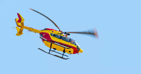 Flying EC 145 helicopter