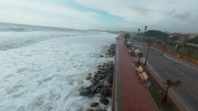 sea waves hurl themselves against the coast
