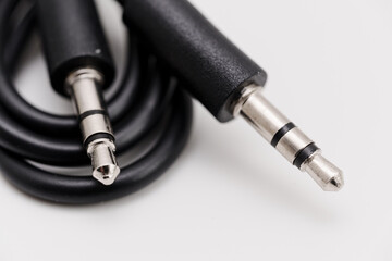 Connecting audio cables for radio receiver use in a home setting