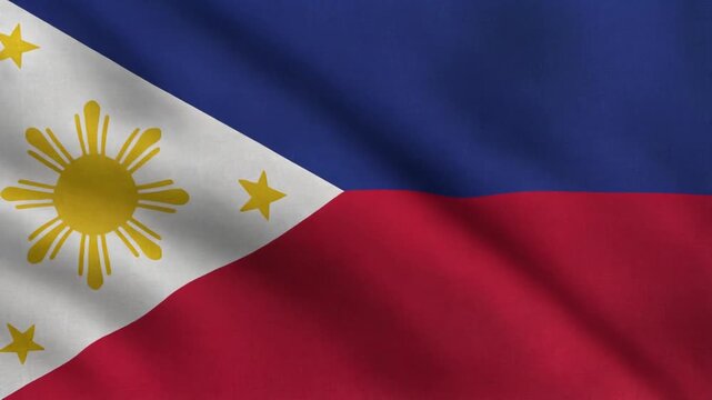 Philippines flag waving proudly under vibrant sky.