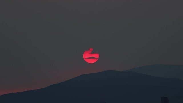 Sunset over Pacific Ocean and Mountains