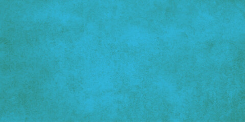 A vintage blue grunge paper texture with an aged watercolor paint pattern and rough canvas backdrop design