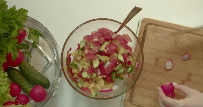 reparing Fresh Vegetable mixing Salad from Above in Home Kitchen 3