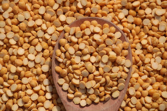 Toor dal is known as tur daal, yellow lentils split peas, indian split pigeon peas, arhar dal, tuvar dal, split peas, Yellow lentils, arahar daal, indian pulses. Concept of vegetarian protein food