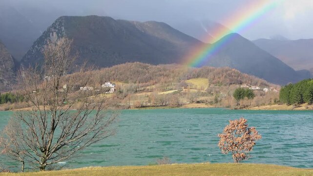 Rainbow landscape on Lake Castel San Vincenzo in the Molise region, in winter.