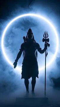 Cinematic silhouette of Lord Shiva holding a trishula trident standing in front of a glowing circular halo light with mystical smoke and blue atmospheric background.