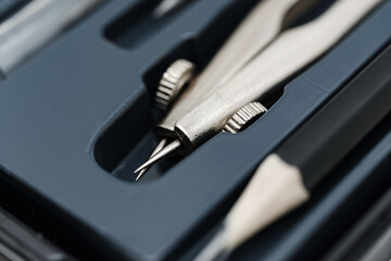 Tool kit with precision instruments for technical drawing