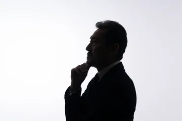 Fotobehang Onderzeeër 悩む男性　シルエット  © naka