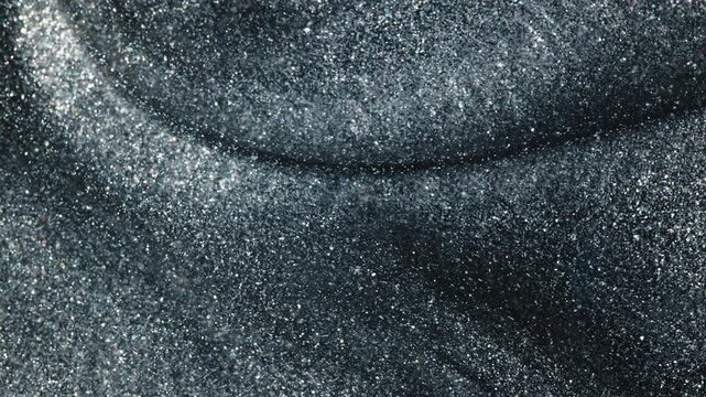Macro view of shimmering ink mixing, abstract visual art concept