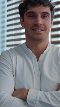 Portrait smiling happy Caucasian business man crossed hands crossing arms looking at camera smile joyful businessman 30s male employer guy confident manager startup owner project developer in office