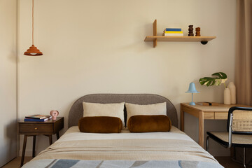 Calm Bedroom Interior with Desk, Chair and Natural Accents