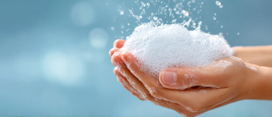 Fototapeta premium Hands holding foamy soap bubbles