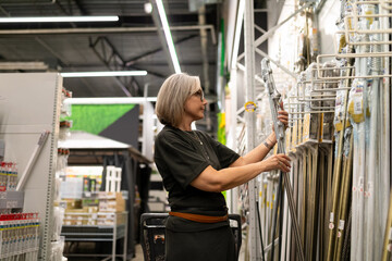 Shopping for home improvement supplies in a hardware store during the day