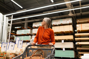 Shopping for home improvement supplies in a spacious hardware store with organized shelves