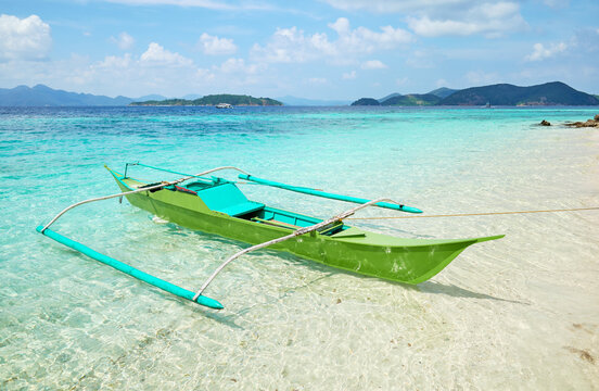 Bangka boat on the beach of an island in the Philippines.
