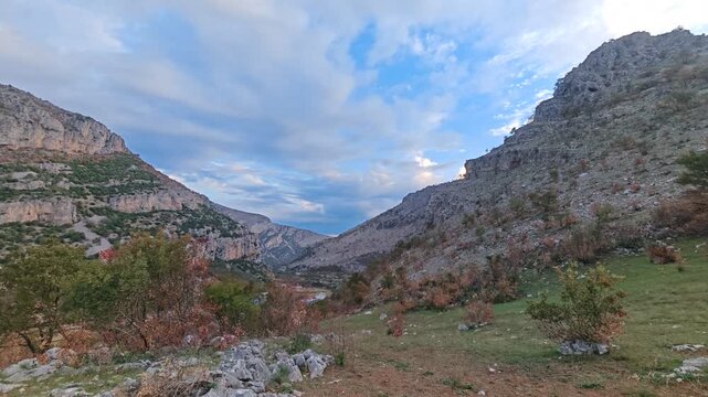 Scenic view of Montenegro mountains and deep canyon valley, showing dramatic rocky relief, pristine nature, and untouched outdoor landscape of the Balkans