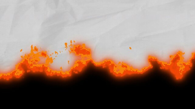 transition of fire burn on textured paper. 4k video.