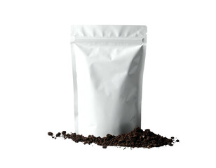 A white, resealable pouch stands before a pile of dark, rich soil