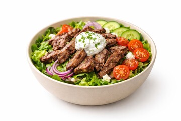Fototapeta premium Beef gyro salad with fresh vegetables and creamy sauce in a white bowl, isolated on white