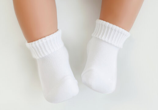 Blank white socks on newborn baby legs mockup, ai generated