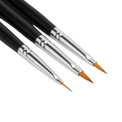 Naklejka premium Assorted calligraphy brush pens with different tip sizes and colors isolated on transparent background