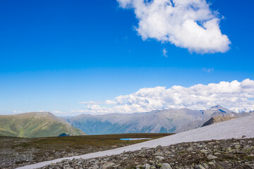 Snow in Kyrgyz valley. Mountain Altai landscape. Russia