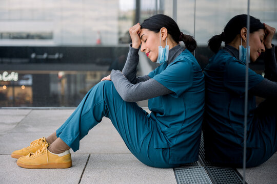 Tired medical professional experiencing burnout and exhaustion