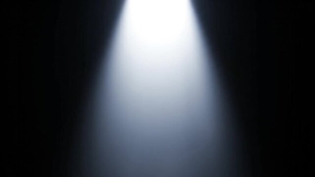 Moving stage lightbeam effect. Dynamic light rays in darkness. Abstract light projection for performance or product display.