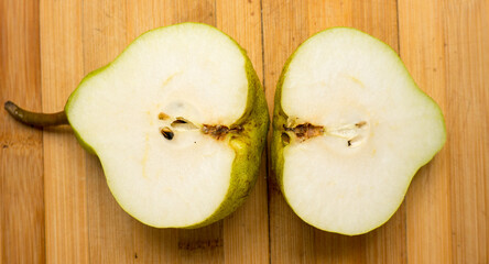 The vegetable Pear on a wooden background.