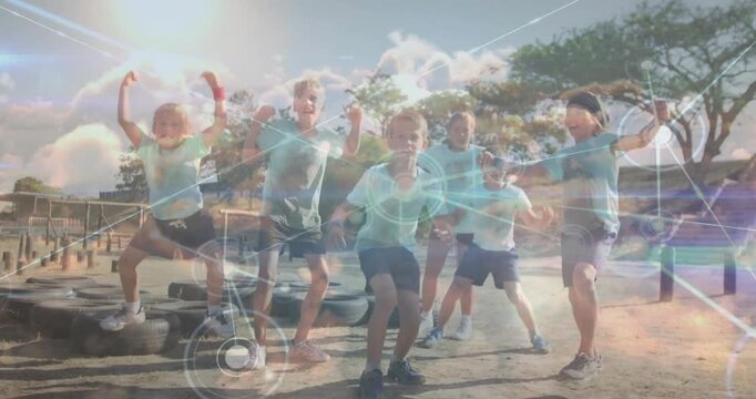 Playing outdoors, children with digital network animation overlay in schoolyard