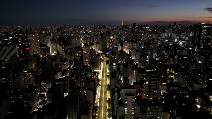 Obraz premium Night Sao Paulo Skyline At Sao Paulo In Brazil. Highrise Buildings Landscape. Downtown Cityscape. Night City. Sao Paulo Skyline At Sao Paulo In Brazil. Business Travel. 