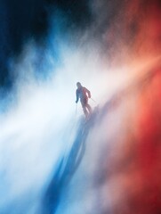 Hybrid graphic photograph, alpine skier emerging from fog, tricolore light leaking into snow shadows, shallow focus poetry