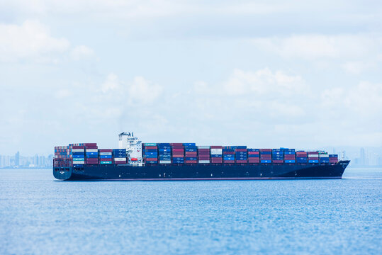 CSCL Zeebrugge fully loaded container ship anchored off the coast of Panama waiting to enter port