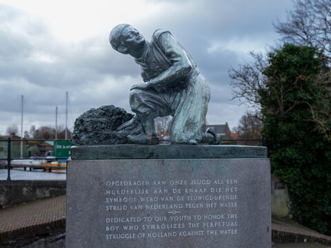 Statue Hans Brinker at the Woerdersluis in Spaarndam, Noord-Holland province, The Netherlands 