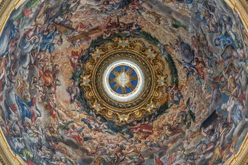 Obraz premium Italy - Rome - Sant Agnese in Agone - Holy Spirit dove radiates glory amid swirling angels and heavenly clouds in dome fresco