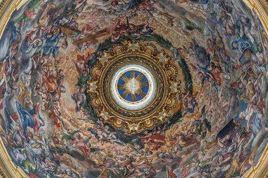 Italy - Rome - Sant Agnese in Agone - Holy Spirit dove radiates glory amid swirling angels and heavenly clouds in dome fresco