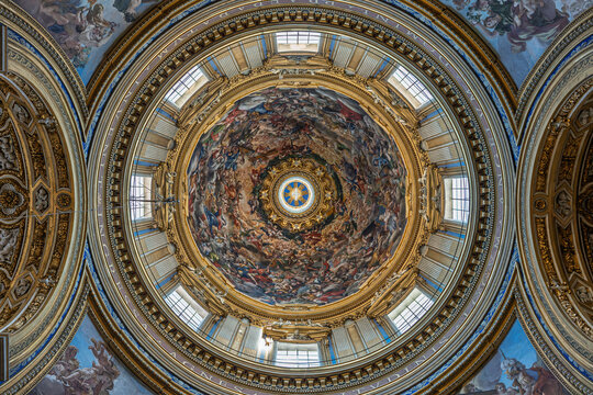 Italy - Rome - Sant Agnese in Agone - Soaring dome interior reveals celestial frescoes and arched windows above