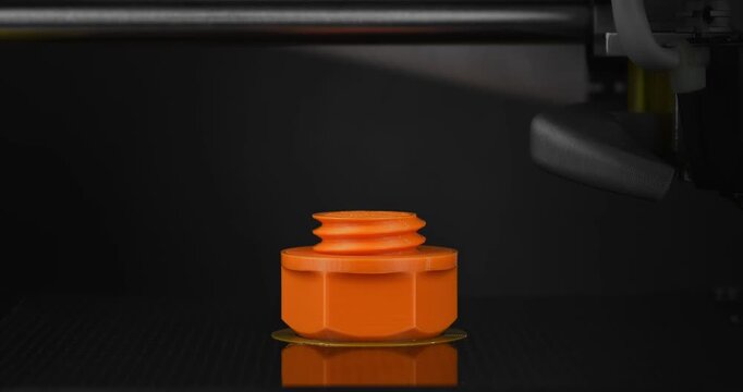 Smooth timelapse of 3D printing a screw made from PETG plastic.