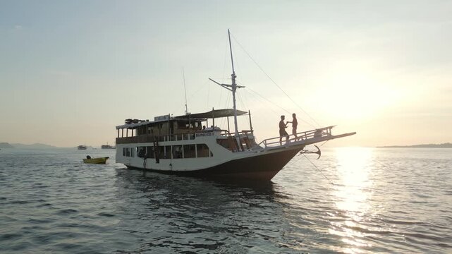 View of a varco at sunset in the sea of komodo