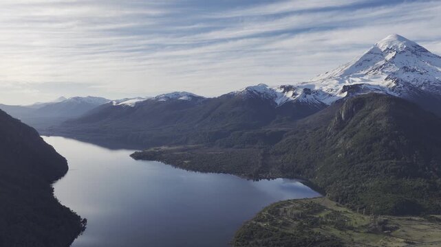 Aerial view View of Snow Capped Lanin Volcano Overlooking Blue Lake. Lanin National Park, Argentina