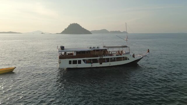 View of a varco at sunset in the sea of komodo