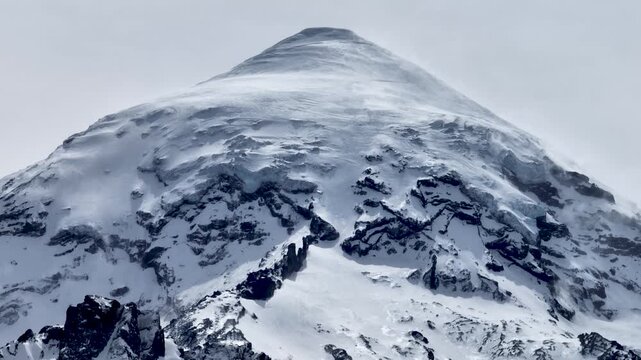 Snow Covered Lanin Volcano Peak with Blowing Wind and Glacier Ice
