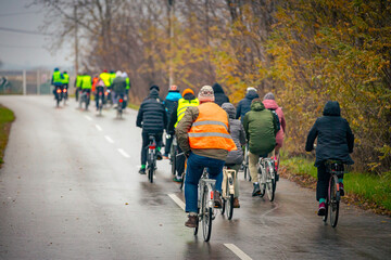Obraz premium Group of cyclists on city road, street, asphalt