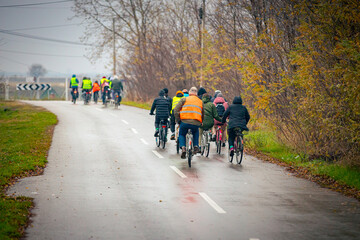 Obraz premium Group of cyclists on city road, street, asphalt