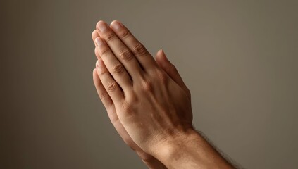 Hands raised in prayer to God