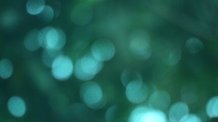 Obraz premium Abstract Green Bokeh Background with Soft Light Diffusion for Creative Design