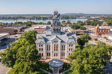 Aerial Drone View of Courthouse Official Building With Clock Tower in Town Square of Downtown Granbury, Texas © Lone Star Stock