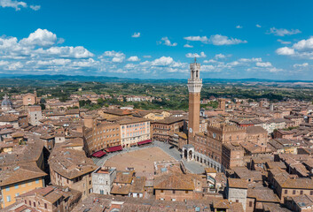 Naklejka premium Aerial view of Siena, Piazza del Campo (Campo square), Palazzo Publico and Torre del Mangia (Mangia tower), Tuscany, Italy