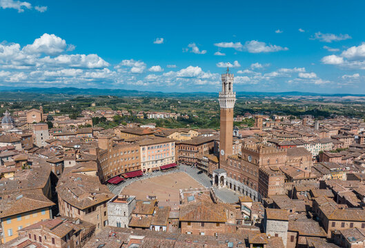 Aerial view of Siena, Piazza del Campo (Campo square), Palazzo Publico and Torre del Mangia (Mangia tower), Tuscany, Italy